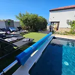 Izziy By The With A Sea View And Heated Pool Razanac