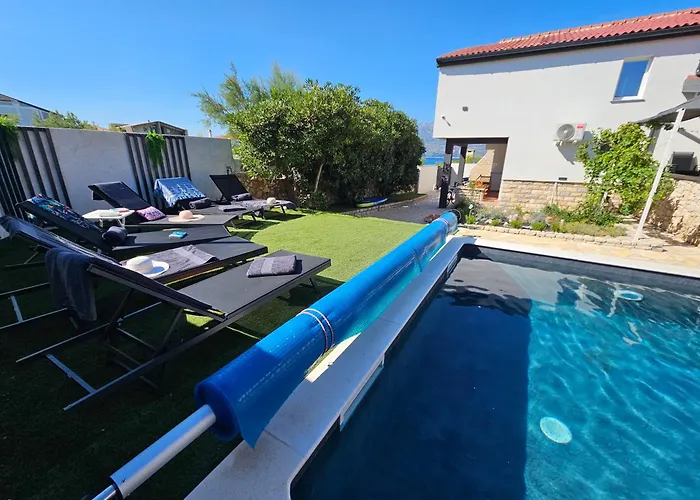 Izziy By The With A Sea View And Heated Pool Ražanac